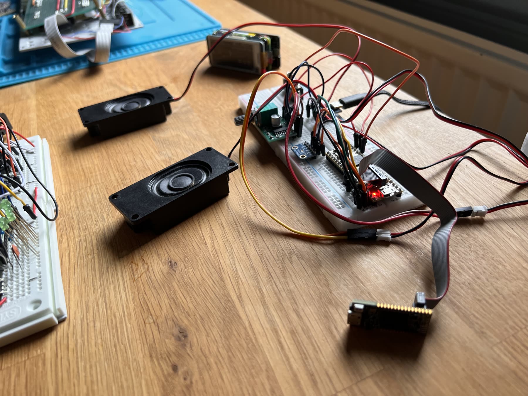 Daisy Seed ambient box prototype with speakers, microphone and small amplifier on a breadboard.