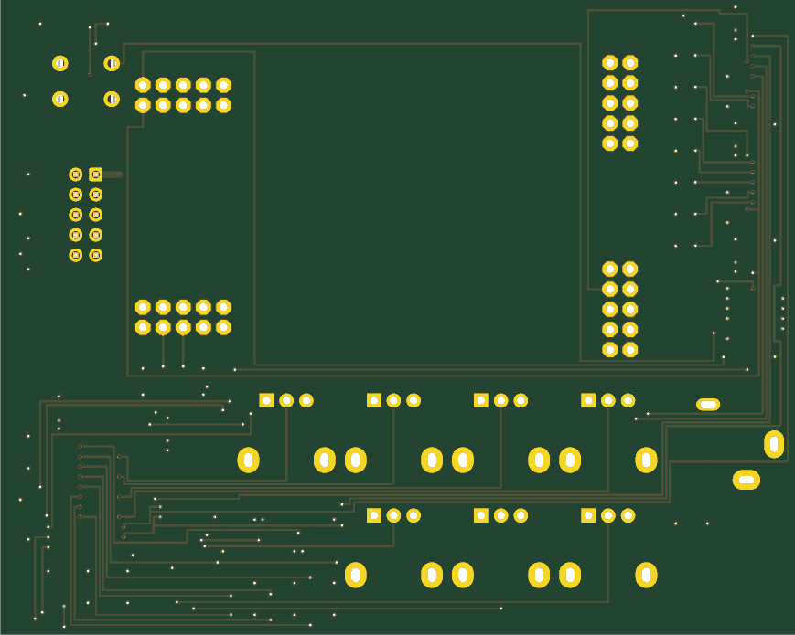 The same board rendered from the back: almost bare dark green, with the gold through-hole pads showing through and a scatter of tiny stitching vias. Thin copper traces run in long parallel staircases along the bottom and left edges, the address and enable lines taking the back of the board because the front was full.